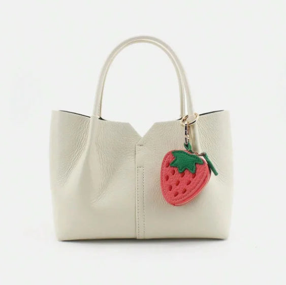Add a sweet touch of nature to your everyday essentials with our Minimalist Cute Fruit Keychain & Coin Purse Set. This adorable