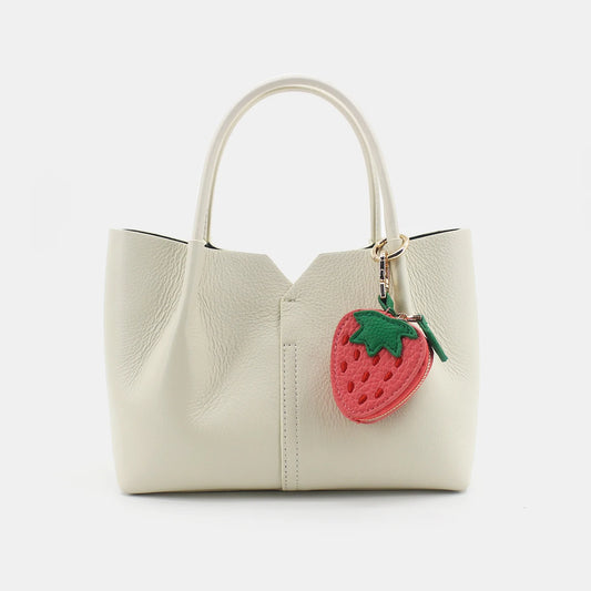 Add a sweet touch of nature to your everyday essentials with our Minimalist Cute Fruit Keychain & Coin Purse Set. This adorable
